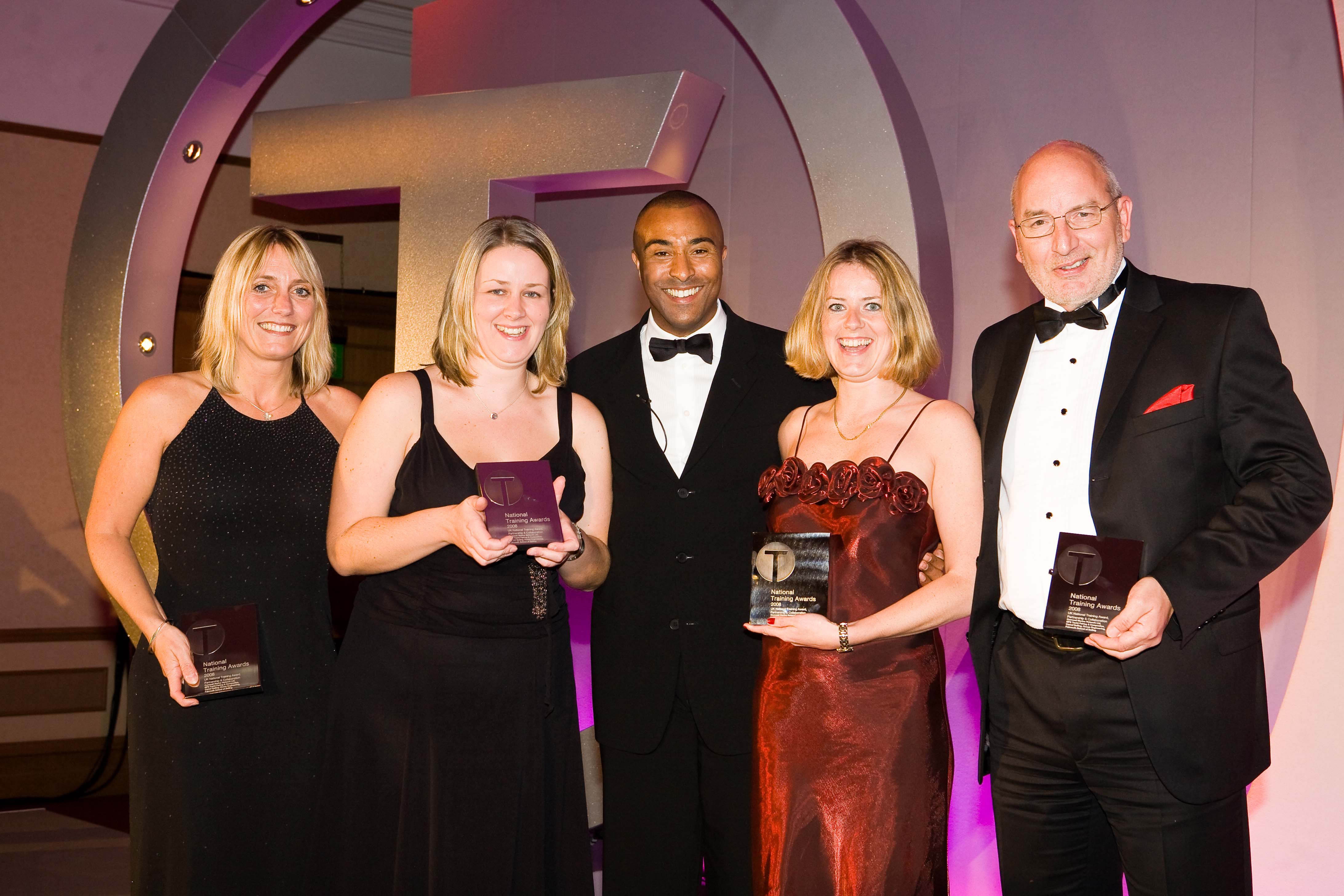 Just Champion! Pictured with Olympic athlete Colin Jackson at the National Training Awards scheme regional ceremony in Bristol are the Cornwall Marine Network party, left to right, Julie Fellows, marine academy manager, Anne-Marie Carroll, training project officer, Dawn Pearce, training services manager, and Paul Wickes, CEO and training director.
