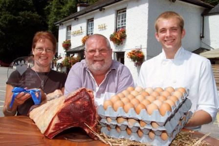 (L-R): Landlords Lesley Brown and Alan Poole with head chef Patrick Cruise and the trophy they are hoping to retain