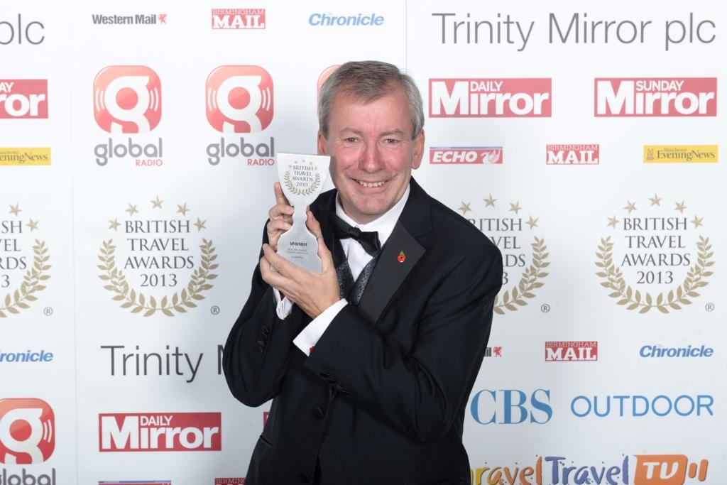 Malcolm Bell collects the British Travel Award