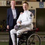Kate McCavana, Grant Funding Consultant at K2 Funding, stands alongside recently sponsored paralympic fencing hopeful, Matthew Campbell-Hill. Image taken inside Truro school fencing building. Sept/14Image by John Liot