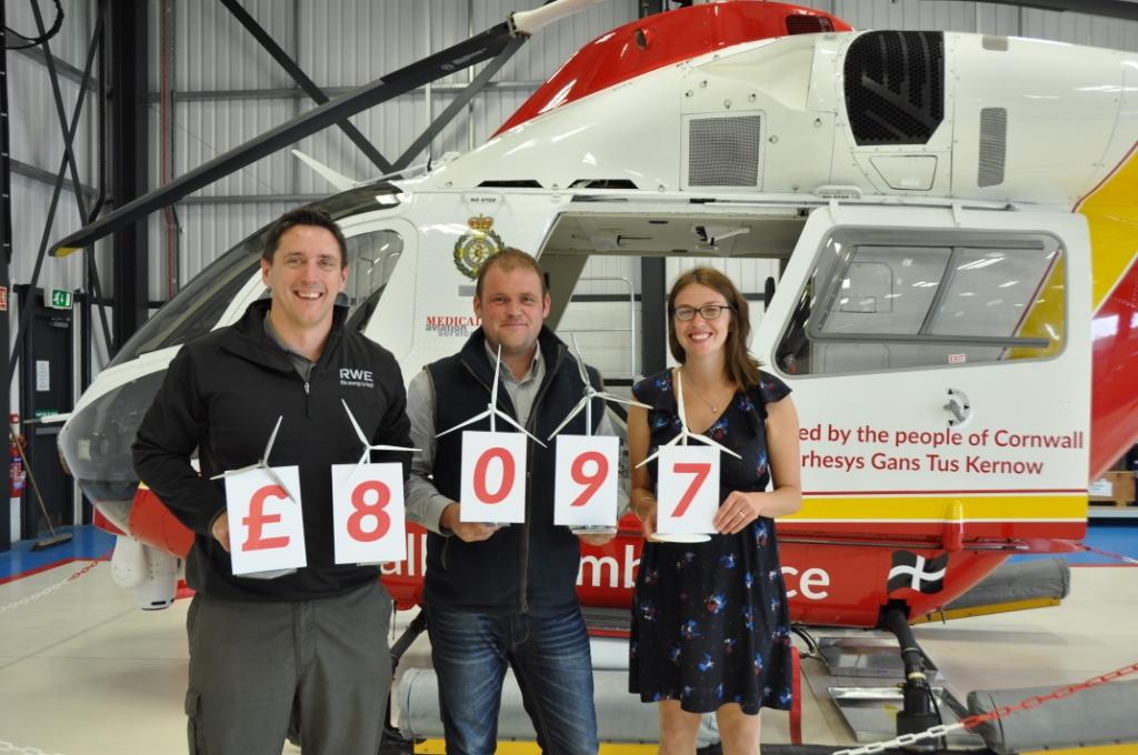 The team from Bears Down Windfarm visit Cornwall Air Ambulance Trust HQ. From left to right Kevin Dodd and Dan Humphreys of RWE with head of fundraising at Cornwall Air Ambulance Trust, Susie Croft